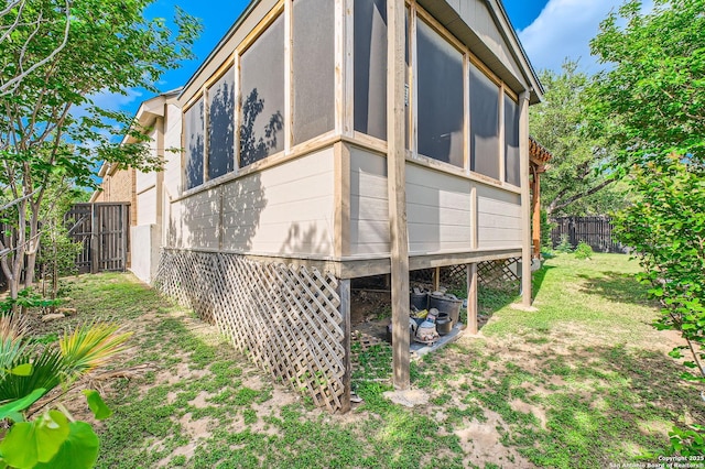 805 Raceland, San Antonio, TX 78245 - view of home's exterior with a fenced backyard and a lawn