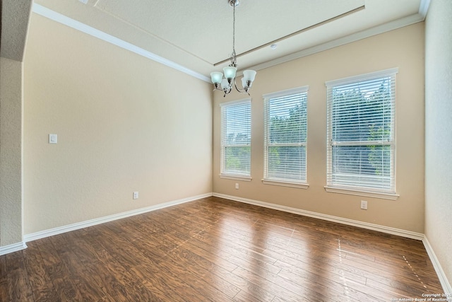 805 Raceland, San Antonio, TX 78245 - empty room with a chandelier, dark wood-style floors, and ornamental molding