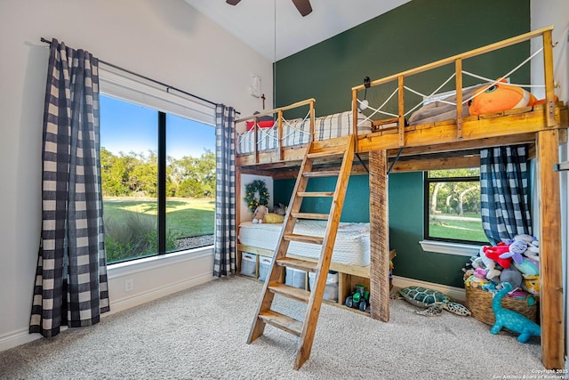 carpeted bedroom with baseboards
