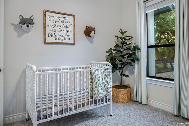 carpeted bedroom with baseboards