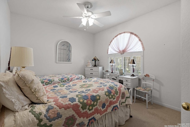 628 Mission Vw, New Braunfels, TX 78130 - bedroom with baseboards, ceiling fan, and light carpet