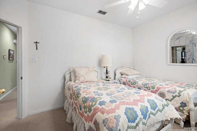 628 Mission Vw, New Braunfels, TX 78130 - carpeted bedroom featuring visible vents, baseboards, and a ceiling fan