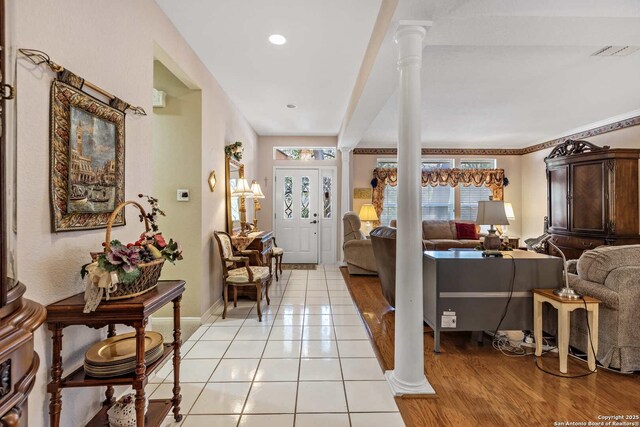 628 Mission Vw, New Braunfels, TX 78130 - entryway featuring visible vents, baseboards, decorative columns, recessed lighting, and light tile patterned flooring