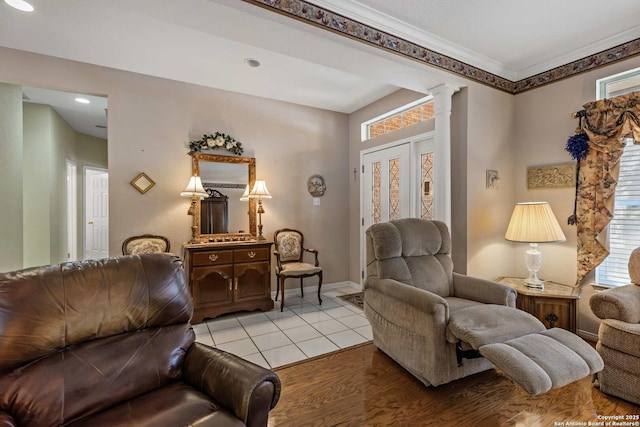 628 Mission Vw, New Braunfels, TX 78130 - living area with baseboards, ornamental molding, ornate columns, recessed lighting, and light tile patterned flooring
