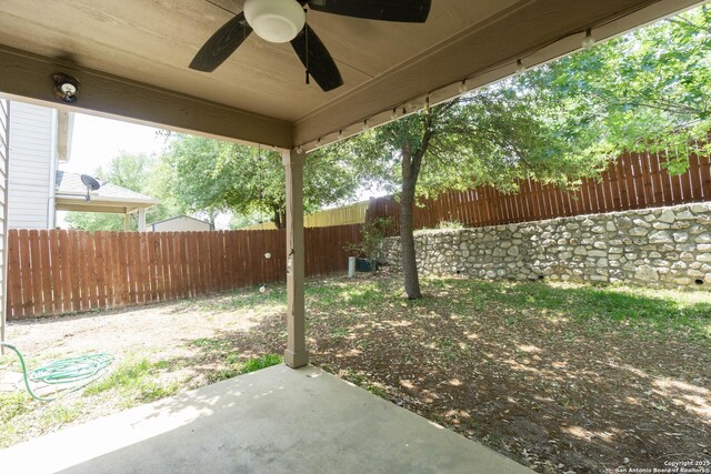 16427 Kentucky, Selma, TX 78154 - view of yard with a patio, a fenced backyard, and ceiling fan