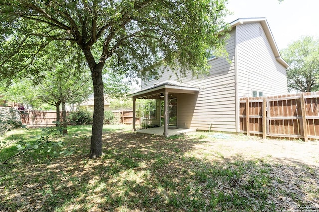 16427 Kentucky, Selma, TX 78154 - view of yard featuring a fenced backyard, ceiling fan, and a patio area