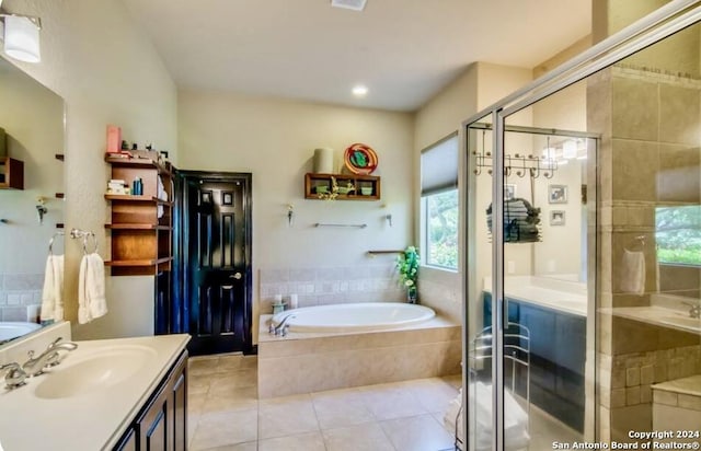 full bathroom with vanity, tile patterned floors, recessed lighting, a garden tub, and a stall shower