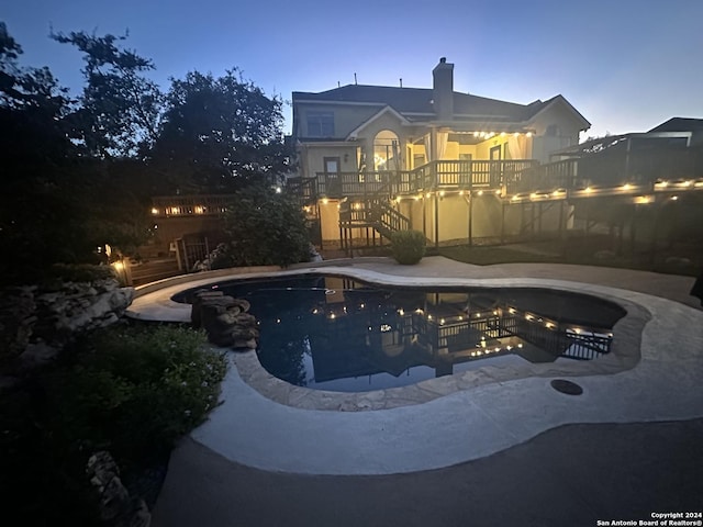 view of swimming pool featuring a fenced in pool and a patio area