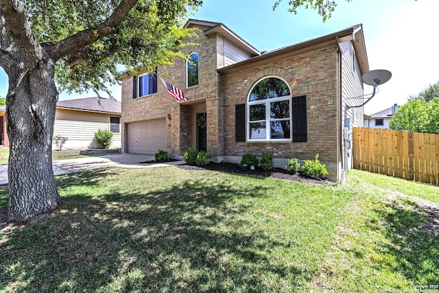 traditional-style house featuring a front lawn, concrete driveway, fence, brick siding, and an attached garage