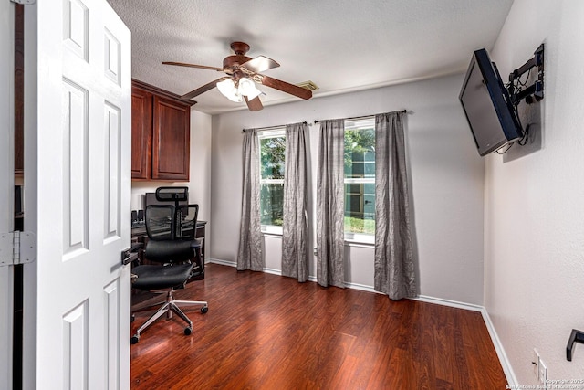 office featuring dark wood-style flooring, baseboards, and ceiling fan