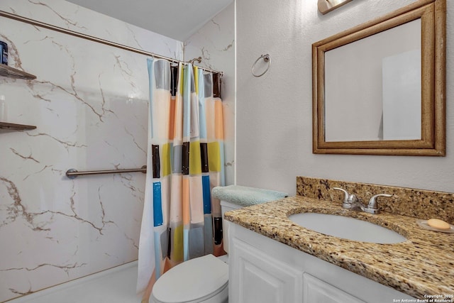 5906 Kissing Oak, San Antonio, TX 78247 - bathroom with a marble finish shower, vanity, and toilet