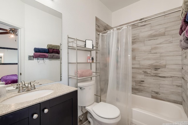 bathroom with a ceiling fan, shower / bath combination with curtain, vanity, and toilet