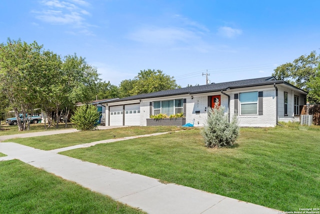 371 Sprucewood Ln, San Antonio, TX 78216 - single story home with brick siding, an attached garage, driveway, and a front yard
