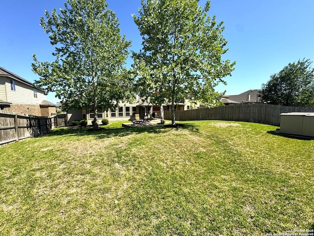 9035 Monument Parke, San Antonio, TX 78254 - view of yard featuring a patio area and a fenced backyard