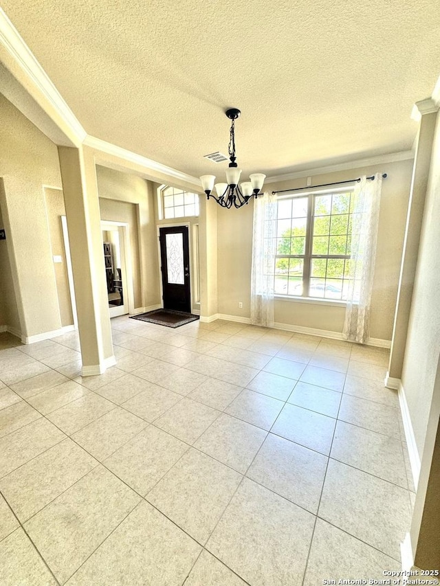 9035 Monument Parke, San Antonio, TX 78254 - unfurnished dining area with an inviting chandelier, visible vents, ornamental molding, light tile patterned flooring, and a textured ceiling