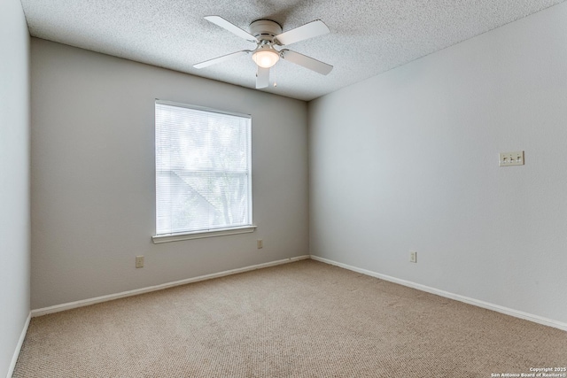 13602 Possum Cv, San Antonio, TX 78232 - carpeted empty room featuring a ceiling fan, a textured ceiling, and baseboards