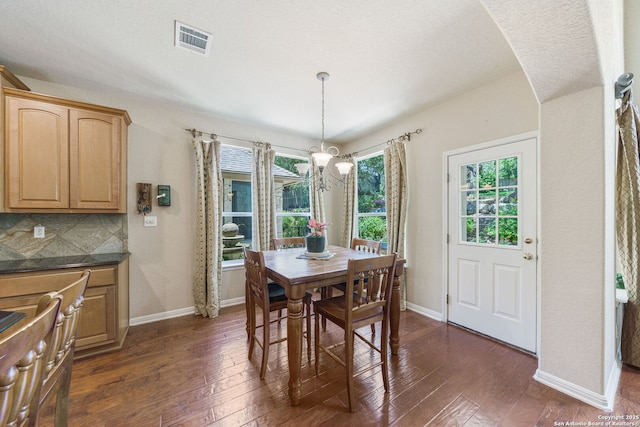 3329 Navasota Cir, San Antonio, TX 78259 - dining space featuring dark wood finished floors and a chandelier