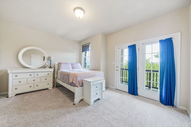 3329 Navasota Cir, San Antonio, TX 78259 - bedroom with access to outside and light colored carpet