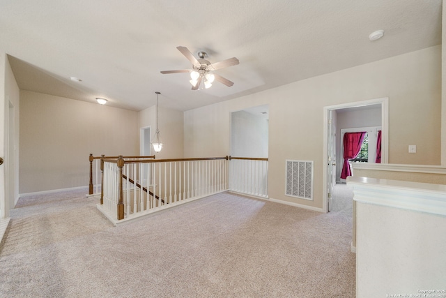 3329 Navasota Cir, San Antonio, TX 78259 - unfurnished room featuring carpet floors, a ceiling fan, and a smoke detector