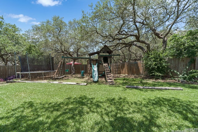 3329 Navasota Cir, San Antonio, TX 78259 - fenced backyard with a playground and a trampoline