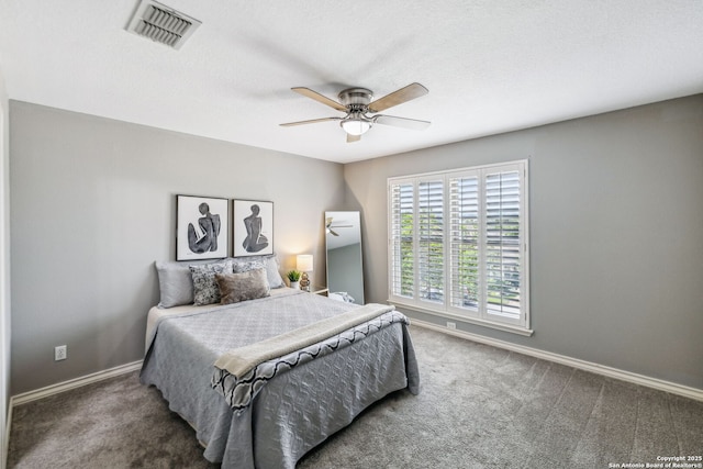 bedroom featuring baseboards, visible vents, carpet, and ceiling fan