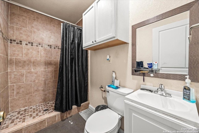 610 Novella, Adkins, TX 78101 - bathroom with vanity, toilet, and a stall shower