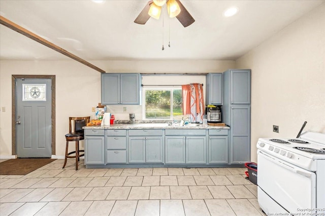 610 Novella, Adkins, TX 78101 - kitchen with a sink, white electric range, a ceiling fan, gray cabinets, and light countertops
