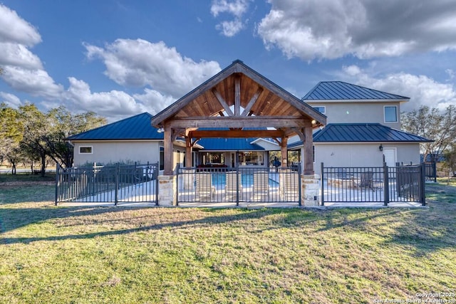 exterior space with a gazebo, a patio, metal roof, and fence
