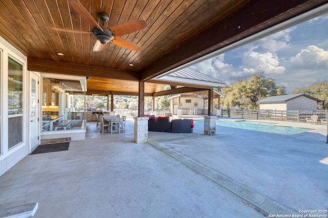 67 Stepping Stone, Concan, TX 78838 - view of patio / terrace featuring fence, a ceiling fan, a fenced in pool, and an outdoor hangout area