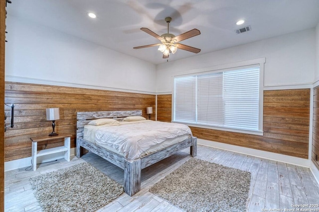 67 Stepping Stone, Concan, TX 78838 - bedroom with wood finished floors, visible vents, recessed lighting, and a ceiling fan