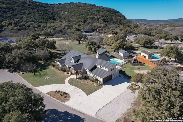 67 Stepping Stone, Concan, TX 78838 - bird's eye view featuring a view of trees and a mountain view