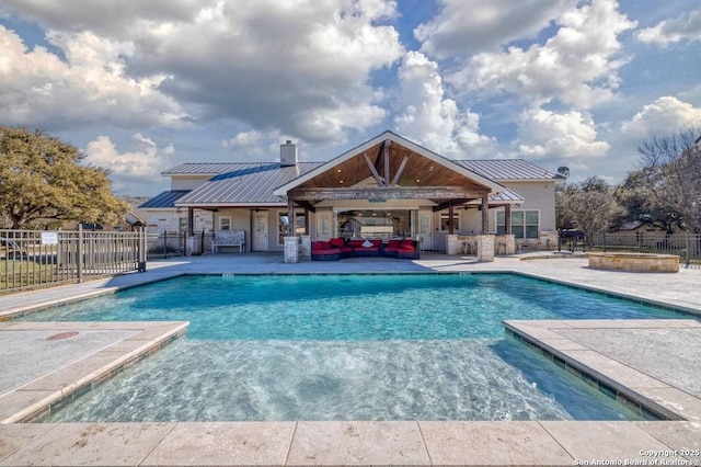 67 Stepping Stone, Concan, TX 78838 - community pool featuring a patio, fence, and an outdoor living space