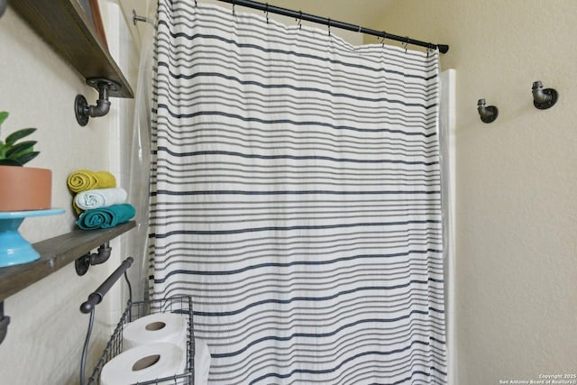 full bathroom with a shower with shower curtain