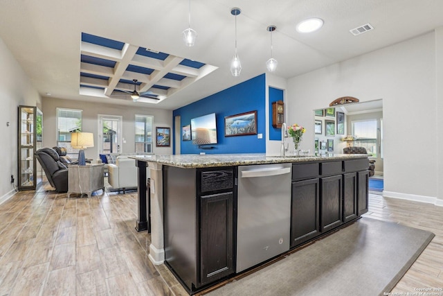 kitchen featuring light wood-style floors, baseboards, open floor plan, and coffered ceiling