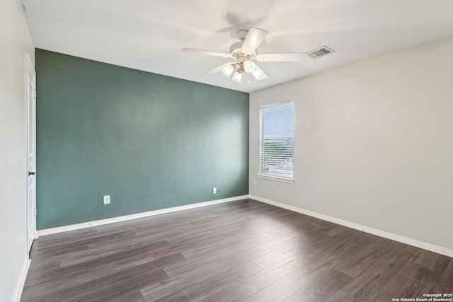 24915 Flying Arrow, San Antonio, TX 78258 - spare room with baseboards, a ceiling fan, wood finished floors, and visible vents