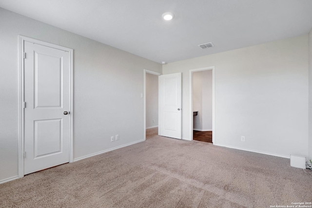 6551 Legato, San Antonio, TX 78252 - unfurnished bedroom featuring visible vents, baseboards, and carpet flooring