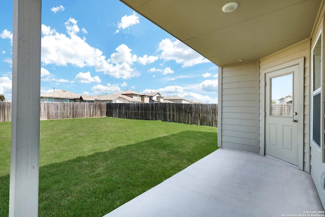 6551 Legato, San Antonio, TX 78252 - view of yard featuring a fenced backyard, a residential view, and a patio