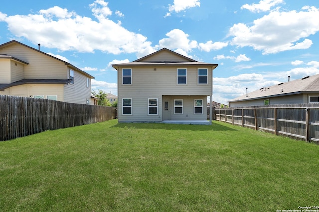 6551 Legato, San Antonio, TX 78252 - back of property with a fenced backyard, a patio area, and a yard