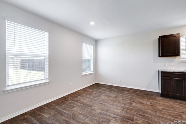 6551 Legato, San Antonio, TX 78252 - interior space featuring baseboards, recessed lighting, and dark wood-style flooring