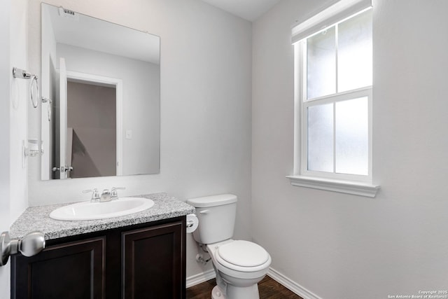 6551 Legato, San Antonio, TX 78252 - bathroom featuring a wealth of natural light, toilet, vanity, and visible vents