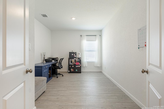 209 Wolf Crst, Seguin, TX 78155 - office area with light wood-style floors and baseboards