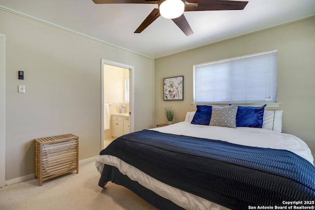1815 Edgehill Dr, San Antonio, TX 78209 - bedroom featuring ensuite bathroom, baseboards, carpet floors, and a ceiling fan