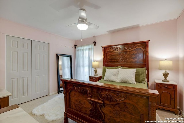 1815 Edgehill Dr, San Antonio, TX 78209 - bedroom featuring light colored carpet, baseboards, a ceiling fan, and a closet