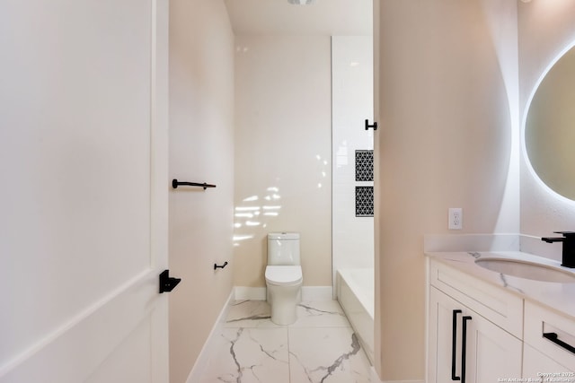 full bath featuring marble finish floor, toilet, vanity, and baseboards