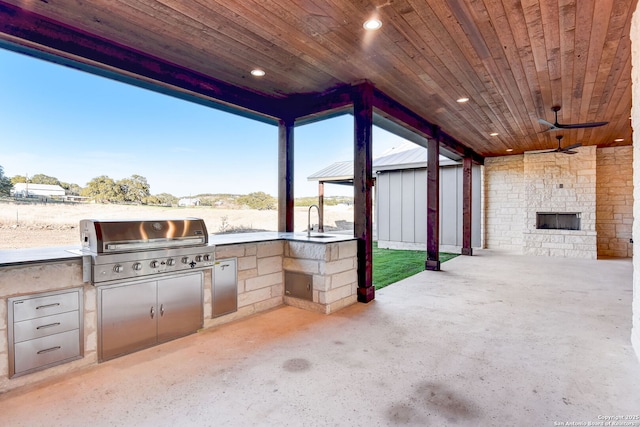 view of patio / terrace with a sink, a gazebo, ceiling fan, grilling area, and area for grilling