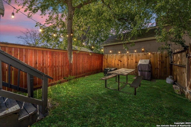 view of yard featuring a fenced backyard