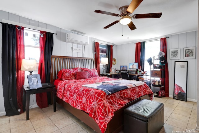 tiled bedroom with ceiling fan, a wall unit AC, and multiple windows