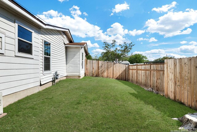 view of yard featuring a fenced backyard