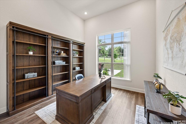 110 Madrone Trl, Boerne, TX 78006 - office featuring wood finished floors, a wealth of natural light, and baseboards