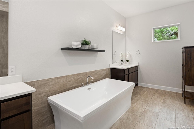 110 Madrone Trl, Boerne, TX 78006 - full bath with a freestanding bath, tile walls, and vanity